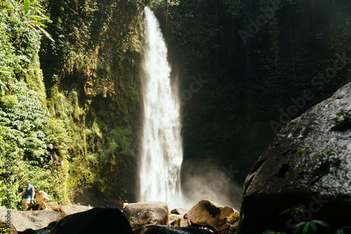 Powerful waterfall in rocky cliff