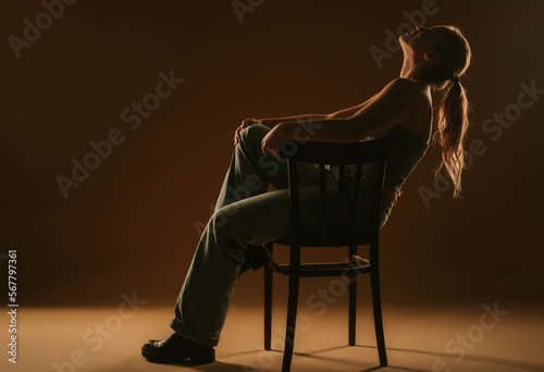 Girl with ponytail sitting