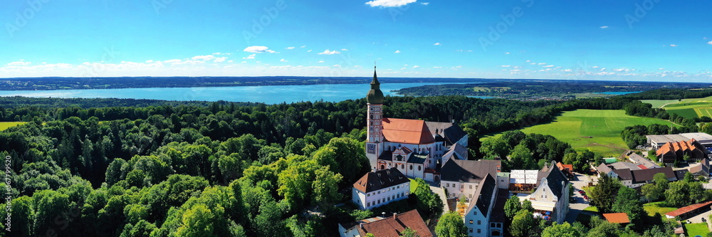 Luftbild vom Kloster Andechs mit Blick auf den Ammersee im Hintergrund. Andechs, Starnberg, Oberbayern, Bayern, Deutschland.