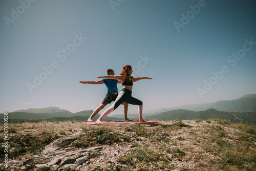 Yoga on the mountain © qunica.com