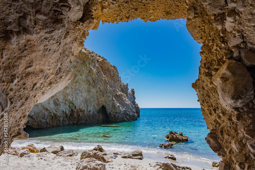 Natural window on Tsigrado beach in Milos, Cyclades islands archipelago GR