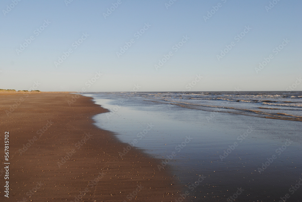 Shore of an empty beach. Empty shore. Beach. Shore of an empty beach. Empty shore. Beach.