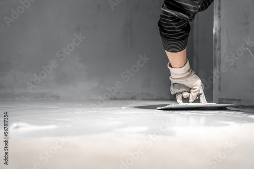 spread the insulation on the concrete floor using a trowel