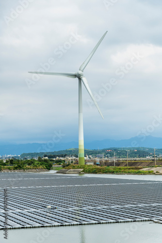 Combining wind power systems and solar power at Houlong Flood Detention Pond in Miaoli  Taiwan.