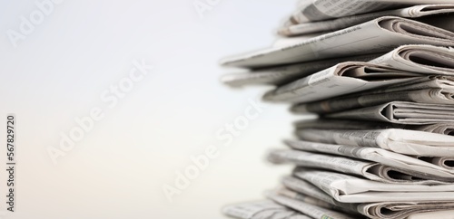 Photos A pile of dusty, old magazines on background