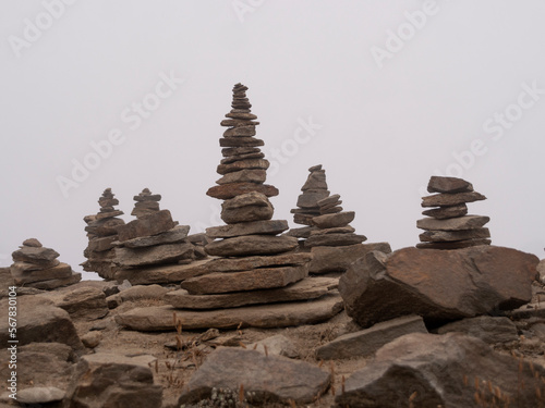 Towers of pebbles or stones along the Mardi Himal trek in Nepal.