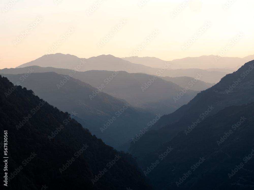 Row of mountains and hills seen at dusk on the Annapurna Base camp trek.