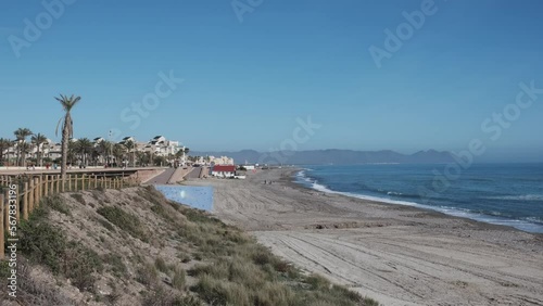 vista general de una playa en el toyo de retamar almeria photo