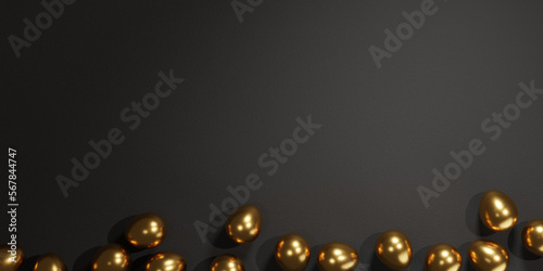 Golden eggs on black textured surface