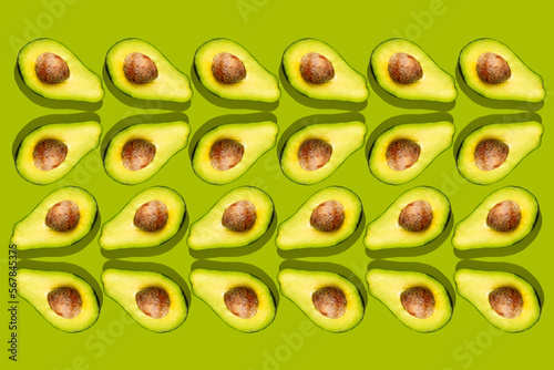 avocado pattern with pit and shadow on vibrant green