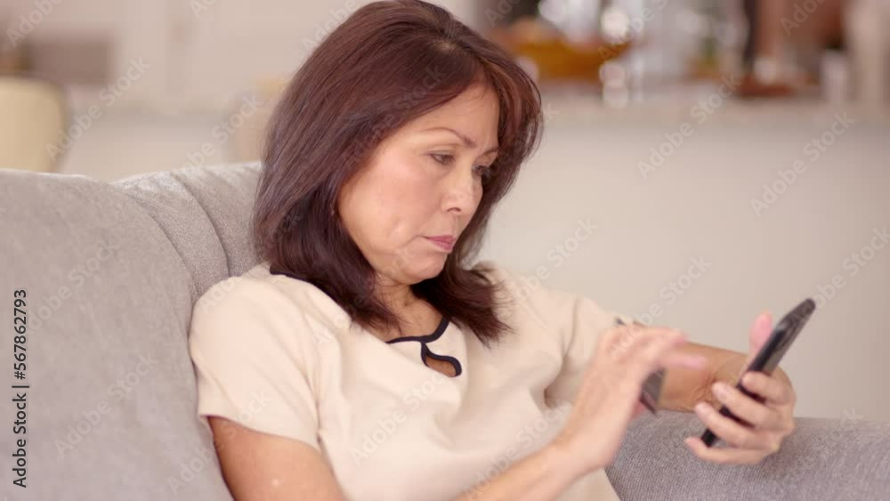 Beautiful stylish woman shopping online with smartphone and e-commerce credit card succeeds in placing internet order