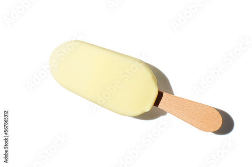 vanilla ice cream on a stick on green pastel background