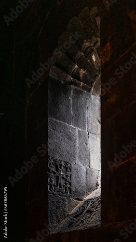 Narrow window, close-up. Geghard Monastery in Armenia. The Monastery of the spear, an architectural structure in the Kotayk region