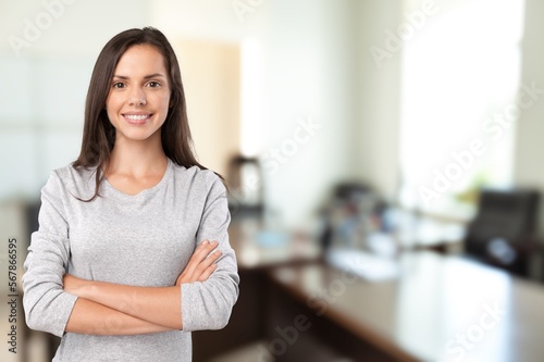 Happy young smart woman posing at home Free Download Happy young smart woman posing at home - GFXLoad