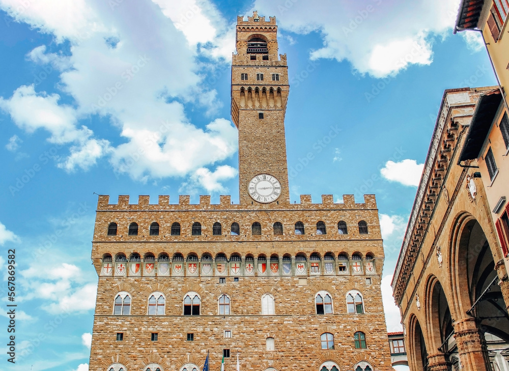 Clock tower, in Palazzo Vecchio's Arnolfo Tower, viewed from a side street, Florence, Italy