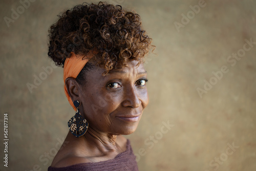 Fotografie Beautiful elderly old 70s or 70+ African American woman looking with a knowing a