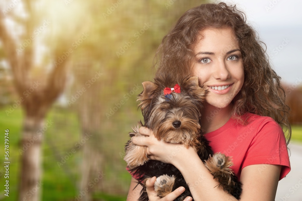 Happy young woman hugging dog pet Happy young woman hugging dog pet