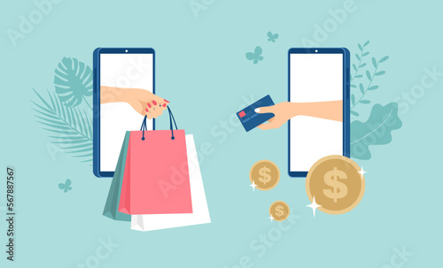 One female hand with packages and the other holding a credit card with gold coins around coming out of smartphone screens. Online shopping concept. Vector illustration in flat style
