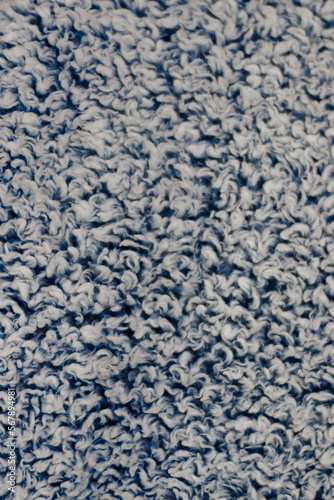 Fabric in fluffy cotton, in shades of white and blue.