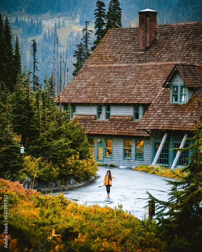 Paradise Inn, Designated as one of the “Great Lodges of the West” viewed from behind the autumn trees on the Nisqually Vista Loop trail in Paradise located on Mount Rainier photo