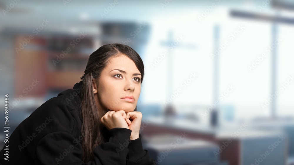 Sad alone young woman thinking at home Sad alone young woman thinking at home
