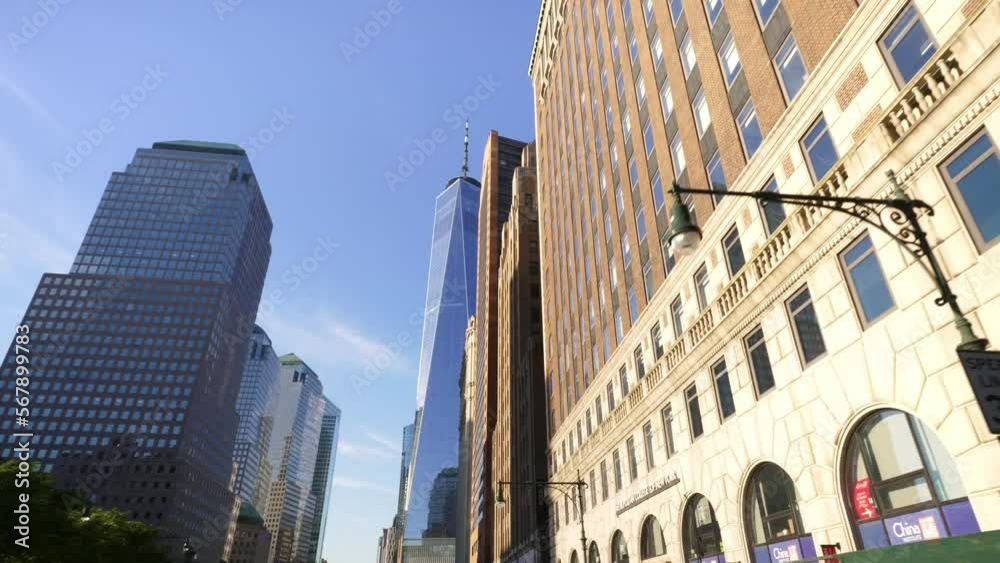 Skyscrapers buildings street in New York City Manhattan. 4k slow motion. American modern urban lifestyle, work in the city, NYC. Skyscrapers buildings street in New York City Manhattan. 4k slow motion. American modern urban lifestyle, work in the city, NYC.
