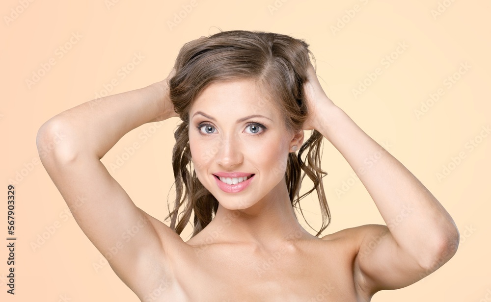 Fototapeta premium Happy young woman after facial treatment.