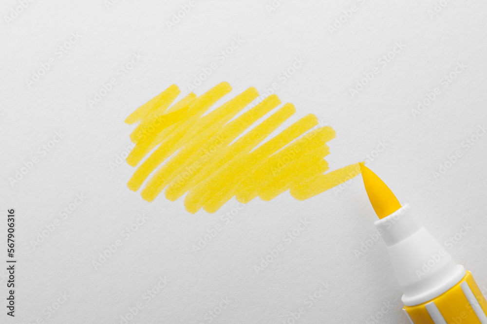 Stroke drawn with yellow marker and highlighter isolated on white, top view Stroke drawn with yellow marker and highlighter isolated on white, top view