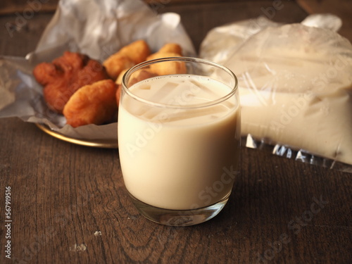 glass of soy milk with Chinese fried dough as breakfast