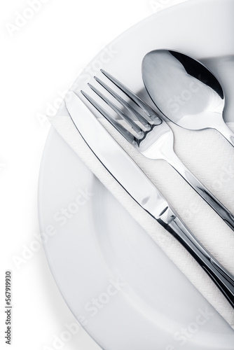 Billede på lærred Silverware. Fork, spoon and knife on the plate