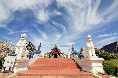 wat banden maetaeng temple ,pink and green serpent statue,white lion statue,pink and blue peacock statue photo