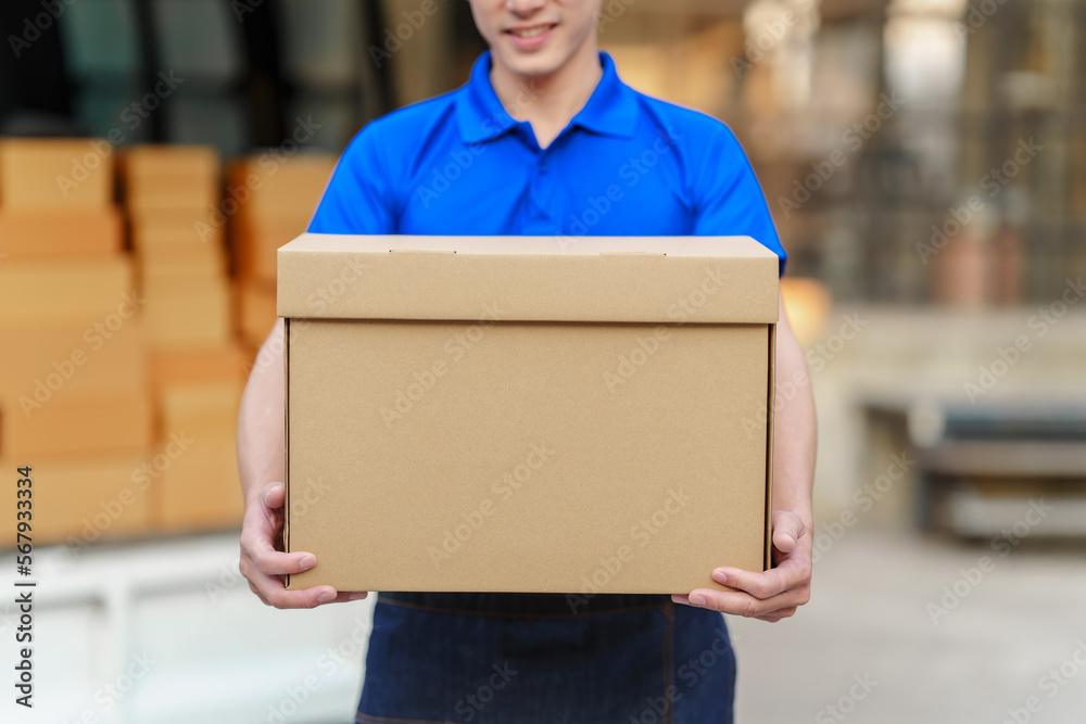 Delivery man asia people checking portable delivery device with parcel box to customer home address. Delivery man asia people checking portable delivery device with parcel box to customer home address.