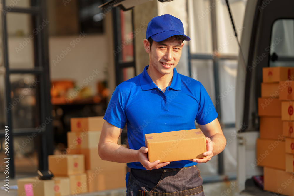 Delivery man asia people checking portable delivery device with parcel box to customer home address. Delivery man asia people checking portable delivery device with parcel box to customer home address.