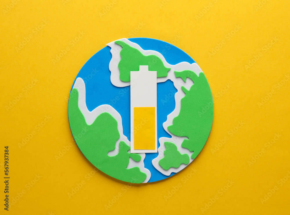 Planet earth with an average battery level on a yellow background.