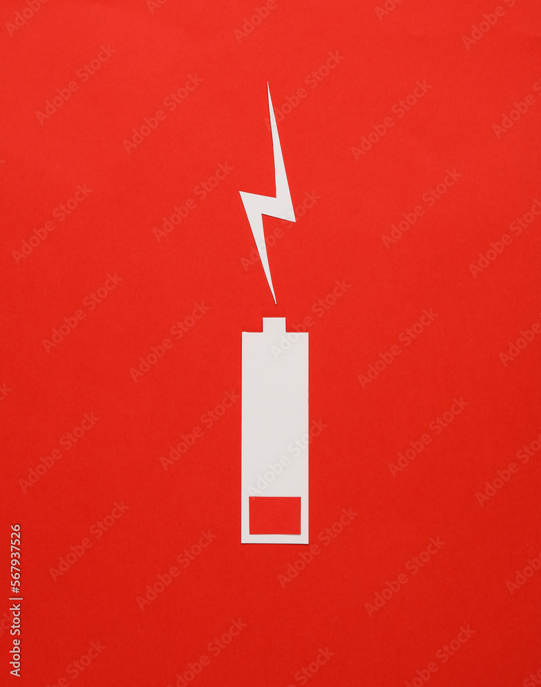 Paper cut low battery on red background - obrazy, fototapety, plakaty 