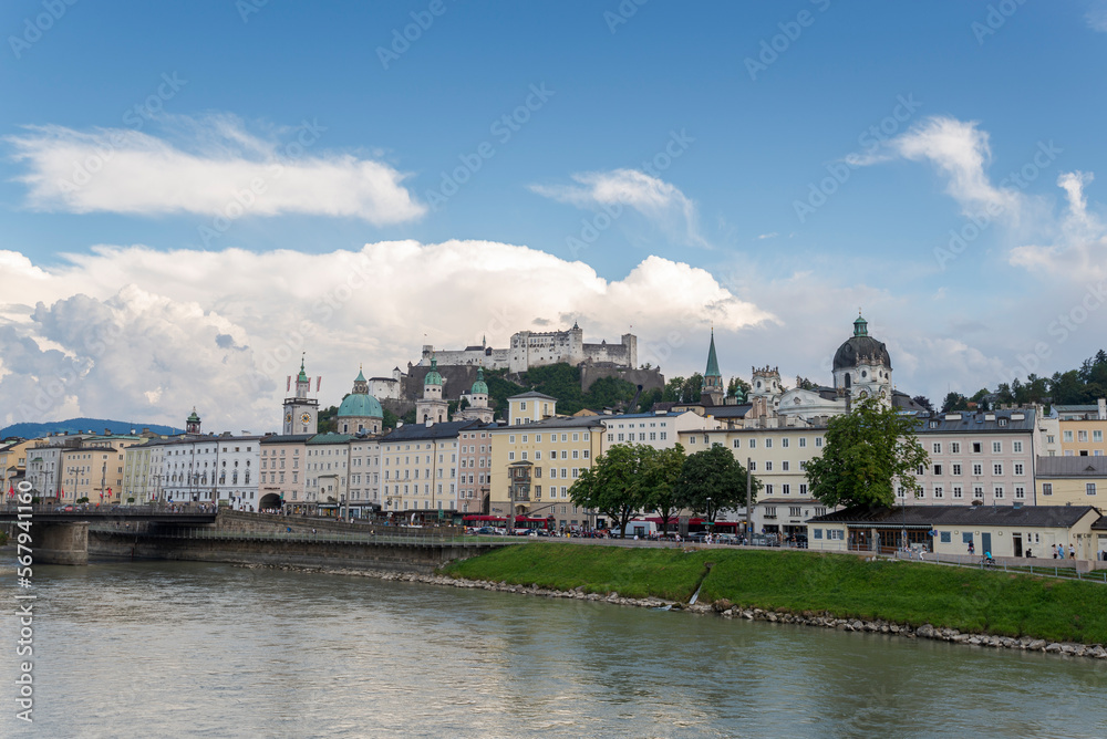 Views of Salzburg, Austria, from the Marko-Feingold-Steg bridge. It can be seen the Collegiate Church, the Franciscan Church, the Hohensalzburg Fortress, the city hall clock tower, the Cathedral