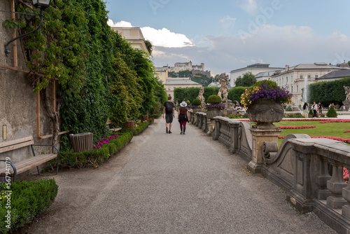Views of Mirabell Palace and Gardens, a tourist destination in the city of Salzburg, Austria. It can be seen the Hohensalzburg Fortress © ihervas
