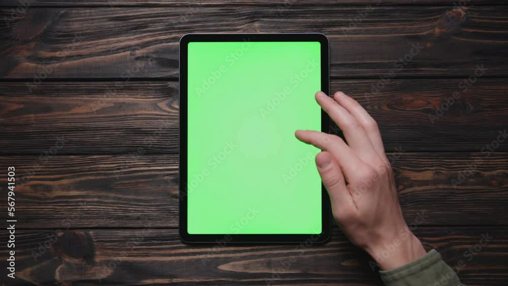 young person using a Tablet pc . close-up. young person using a Tablet pc . close-up.