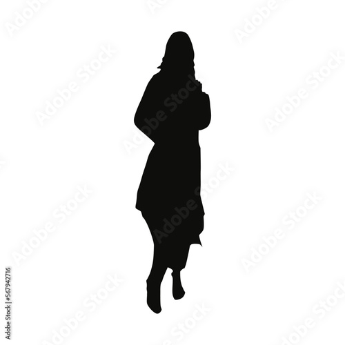 Muslim woman with veil standing alone. holding hand bag silhouette vector illustration