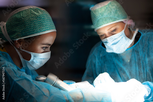Neurosurgical residents positioning a patient