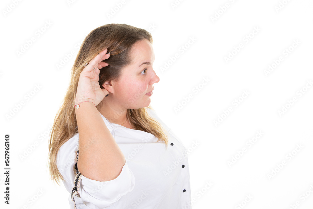 blonde woman earing holding hand near ear trying to listen interesting news expressing communication concept in white background blonde woman earing holding hand near ear trying to listen interesting news expressing communication concept in white background