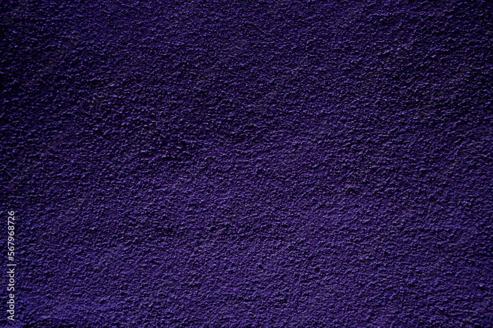 Purple colored abstract wall background with textures of different shades of purple Purple colored abstract wall background with textures of different shades of purple