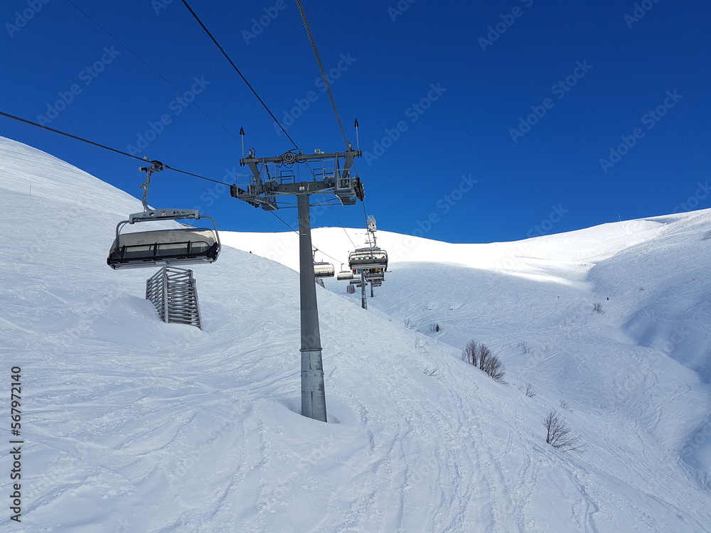 ski lift, recreation in the mountains skiing or snowboarding ski lift, recreation in the mountains skiing or snowboarding