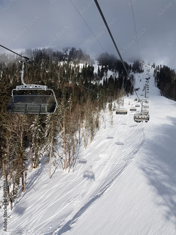 ski lift, recreation in the mountains skiing or snowboarding ski lift, recreation in the mountains skiing or snowboarding