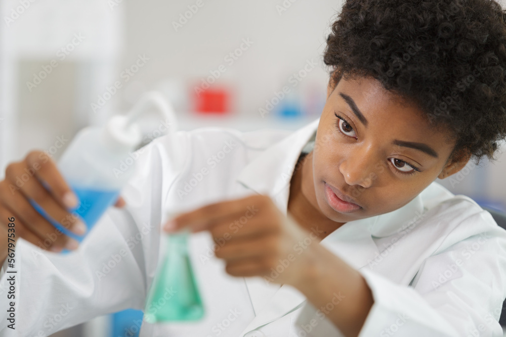 black female chemist student conducting research black female chemist student conducting research