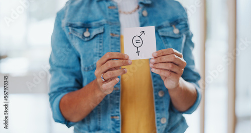 Bild auf Leinwand Gender equality, pay gap and woman with a sign in the office with a female and male symbol