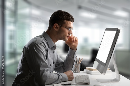 Busy young business man worker typing on pc