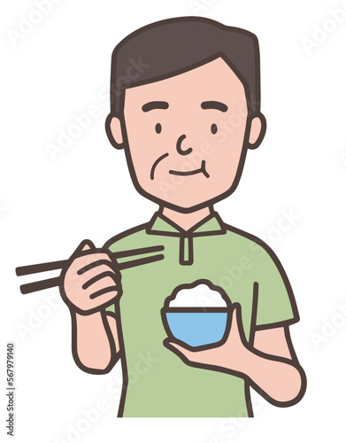 お茶碗を持ってご飯を食べる中年男性、おじさん