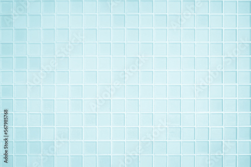 Blue pastel ceramic wall and floor tiles abstract background. Design geometric mosaic texture decoration of the bedroom. Simple seamless pattern for backdrop advertising banner.