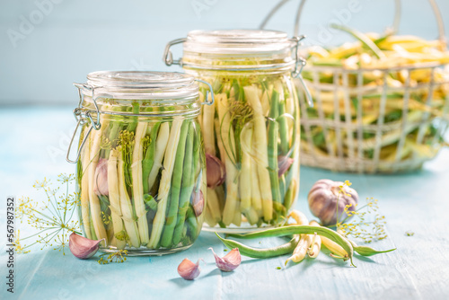 Healthy pickled yellow and green beans with vegetables from greenhouse.